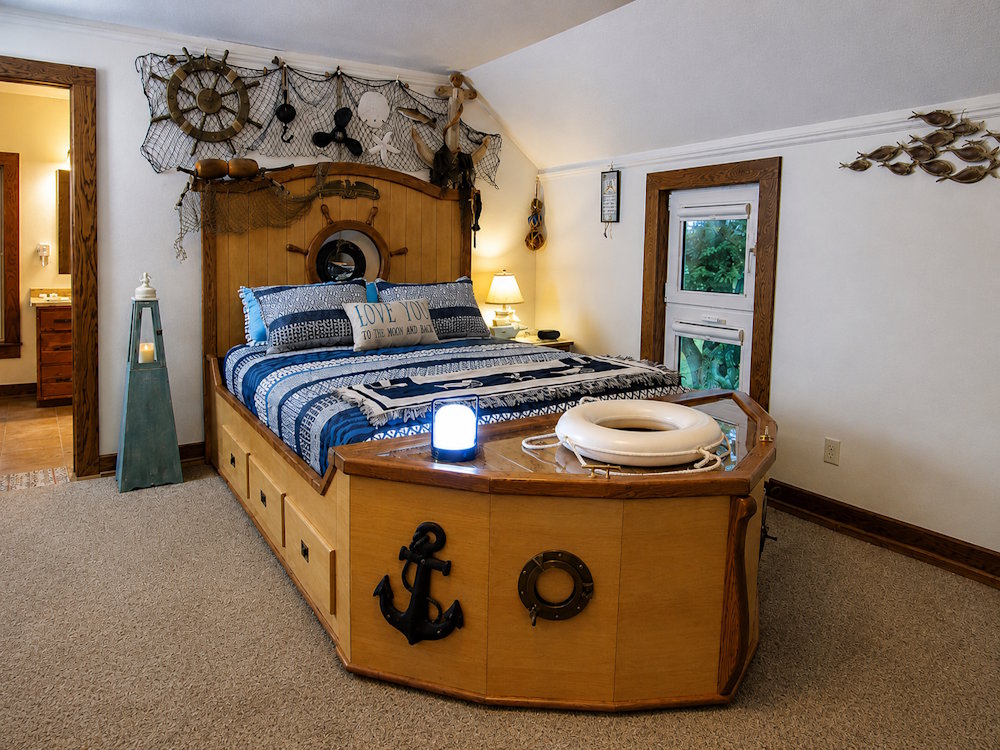Boat-shaped bed with nautical décor at Riverwood Farm