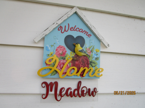 Welcome sign to Meadow room.